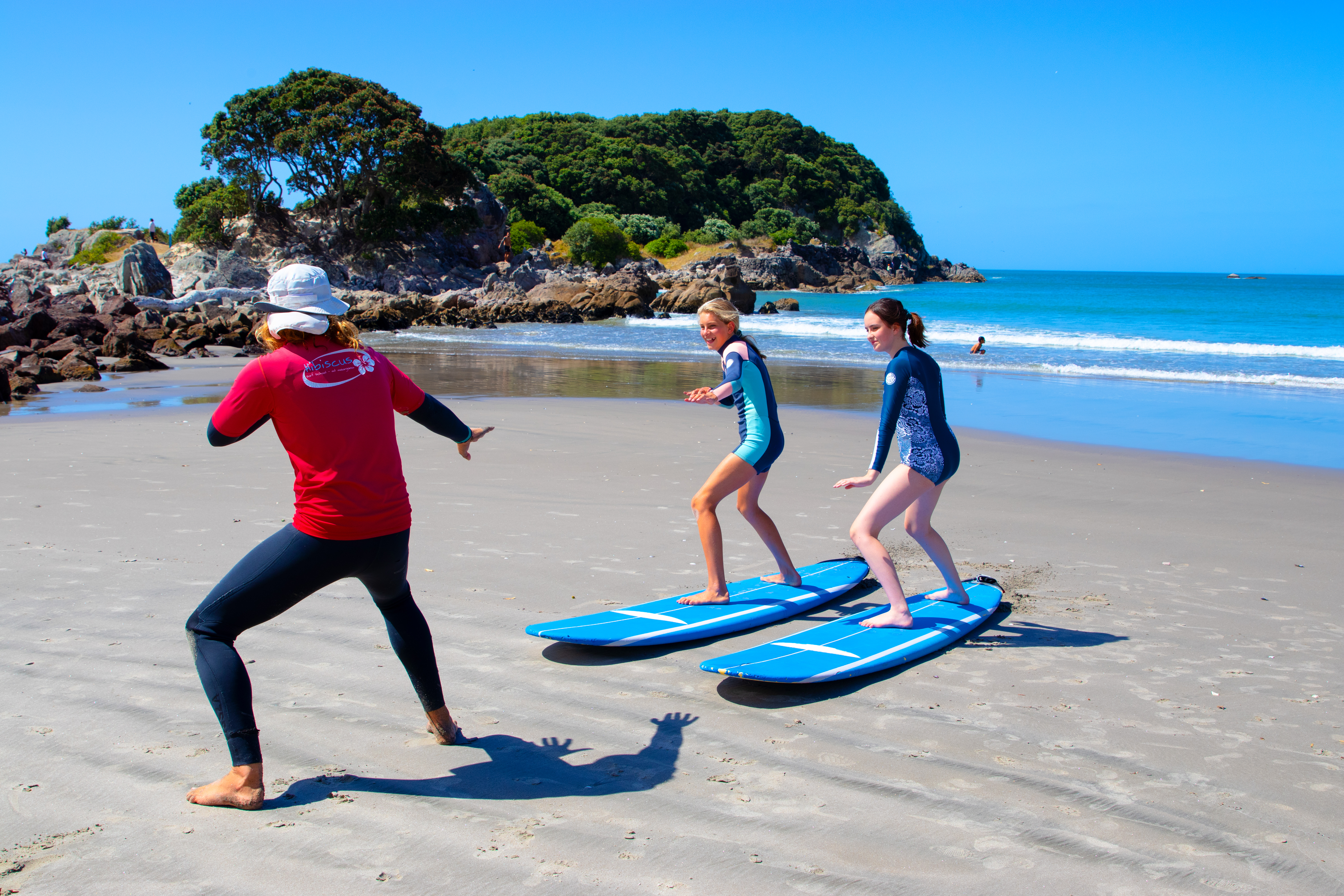 Surf school helps kids learn how to surf on shore first. PC: Surf2Surf