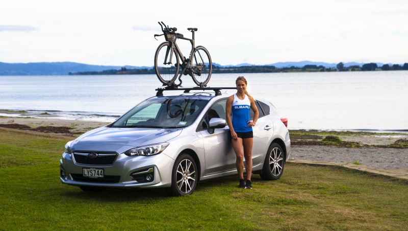 New Subaru brand amabassador Hannah Wells with her Subaru Impreza. Photo Credit: Paul Brunskill