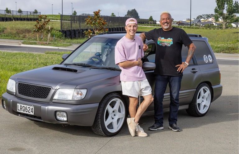 Liam Lawson (left) with I AM HOPE founder Mike King and the Subaru Forester that is being auctioned for the youth mental health charity. 