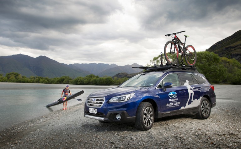 Subaru Brand Ambassador Braden Currie with his Subaru Outback, which has enabled him to ‘do’ his very best to prepare for a fourth Kathmandu Coast to Coast victory in February. PHOTOS FREE FOR EDITORIAL USE.
