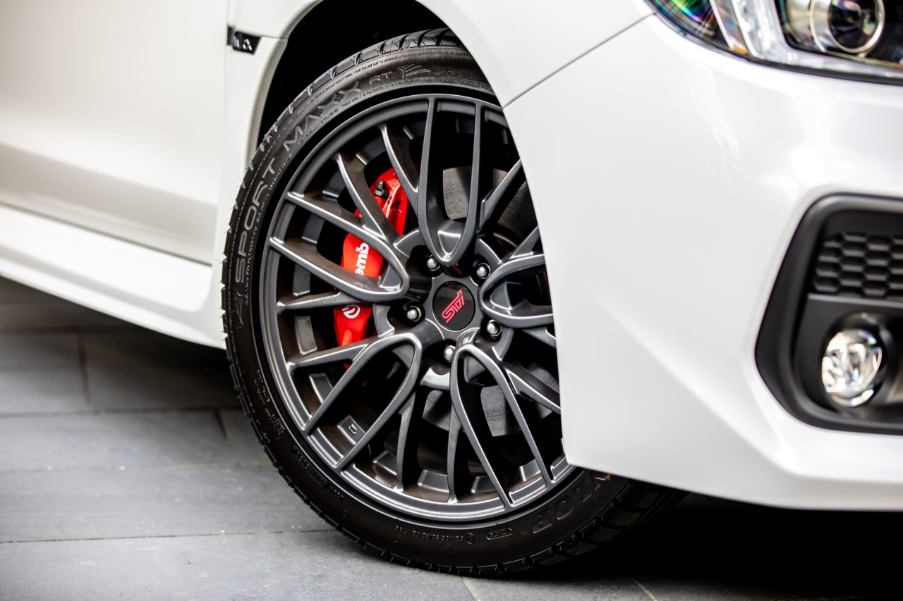 The manual version of the SAIGO WRX features red Brembo brakes.