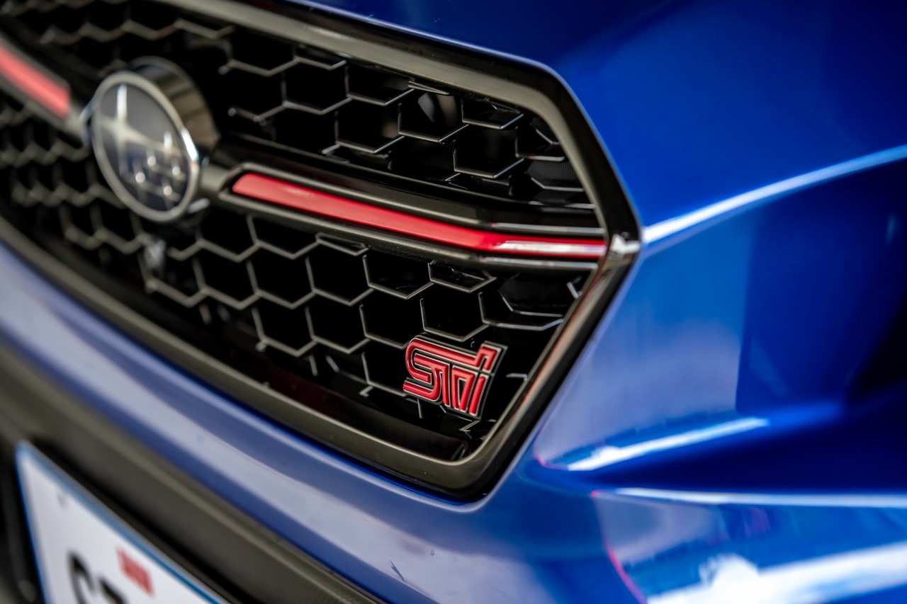The limited edition 2021 Subaru Saigo WRX STI has a front grille with a red pin stripe.