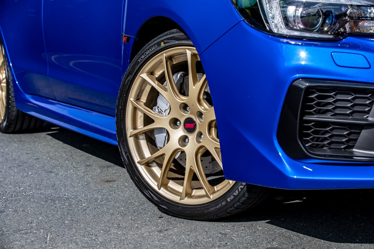 The 2021 Subaru Saigo WRX STI is shod in 19” forged gold alloy wheels.