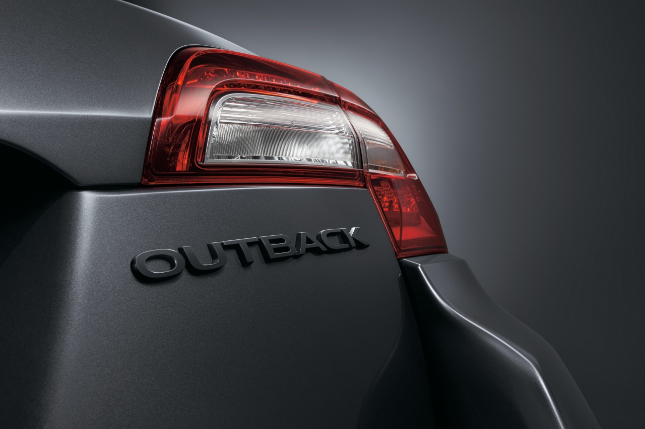 The Subaru Outback X has a black rear badging.