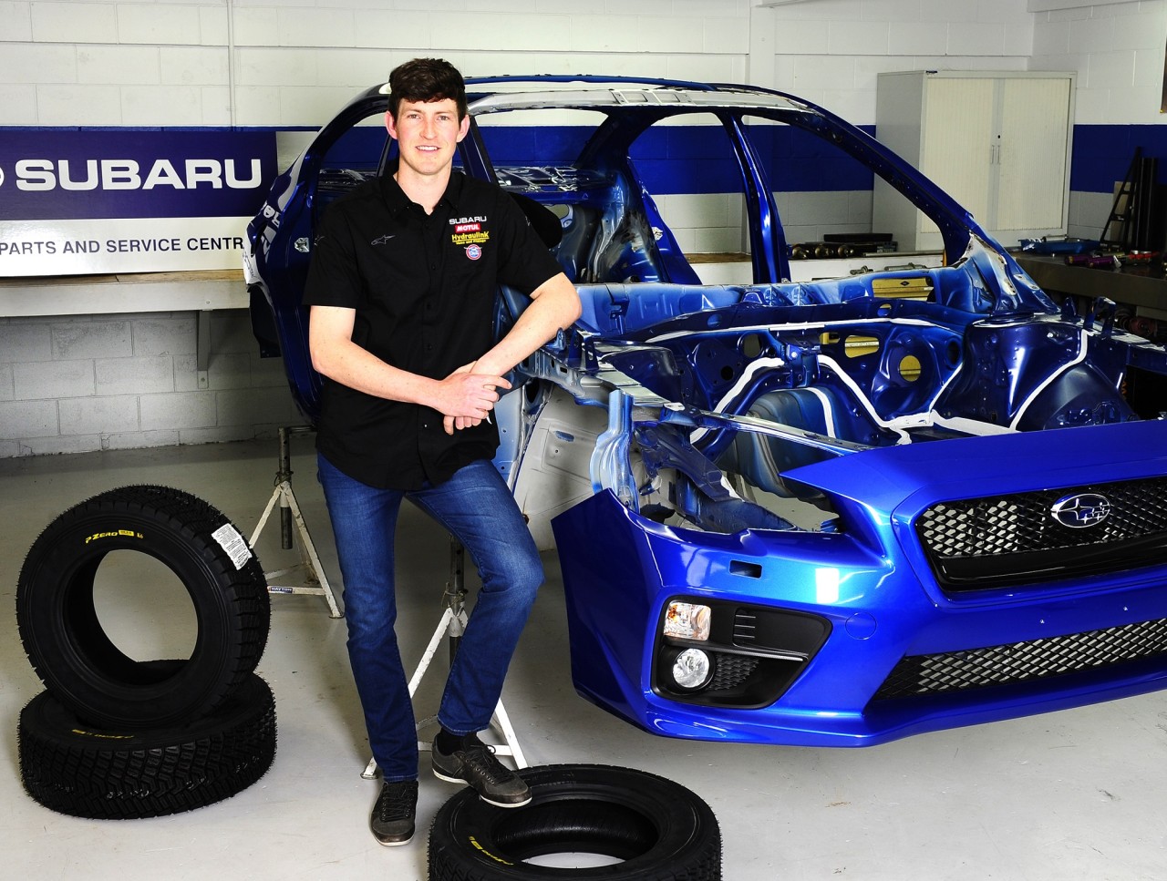 Subaru Brand Ambassador Ben Hunt with the bare shell of his Subaru WRX STi NR4 which he will have built-up for the 2016 New Zealand Rally Championship.  CREDIT: GEOFF RIDDER.
