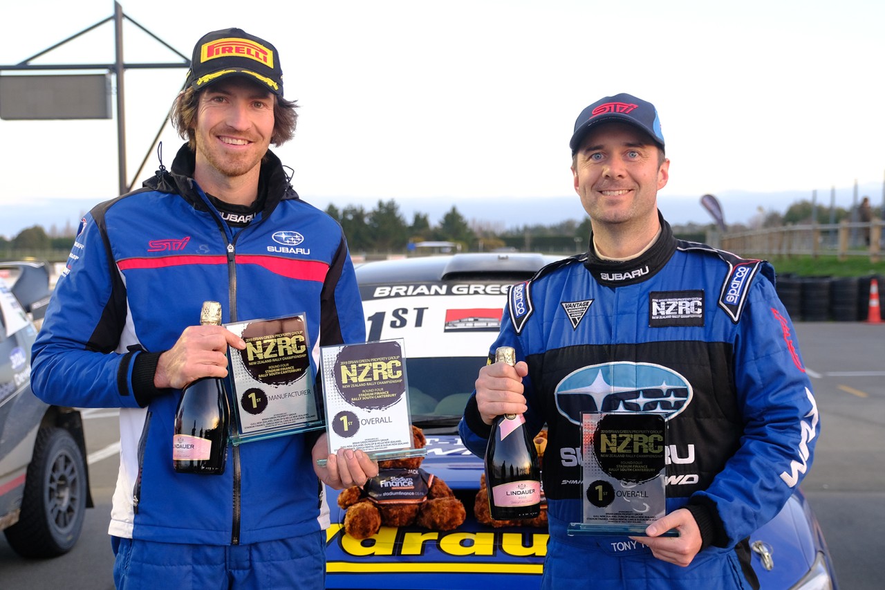 Subaru brand ambassador Ben Hunt (left) and co-driver Tony Rawstorn with their NZRC winners' trophies after the Stadium Finance South Canterbury Rally today. PHOTO: GEOFF RIDDER. 