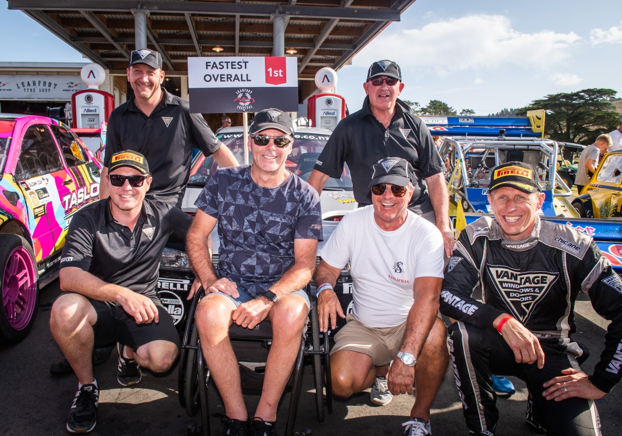 The Vantage team celebrates the win. Behind is Paul Hayton (left) and Chris Kitzen and front (left to right) is Mike Thompson, Vantage Principal Craig Vincent, Vantage Managing Director Mitch Plaw and driver Alister McRae. PHOTO: WISHART MEDIA. 