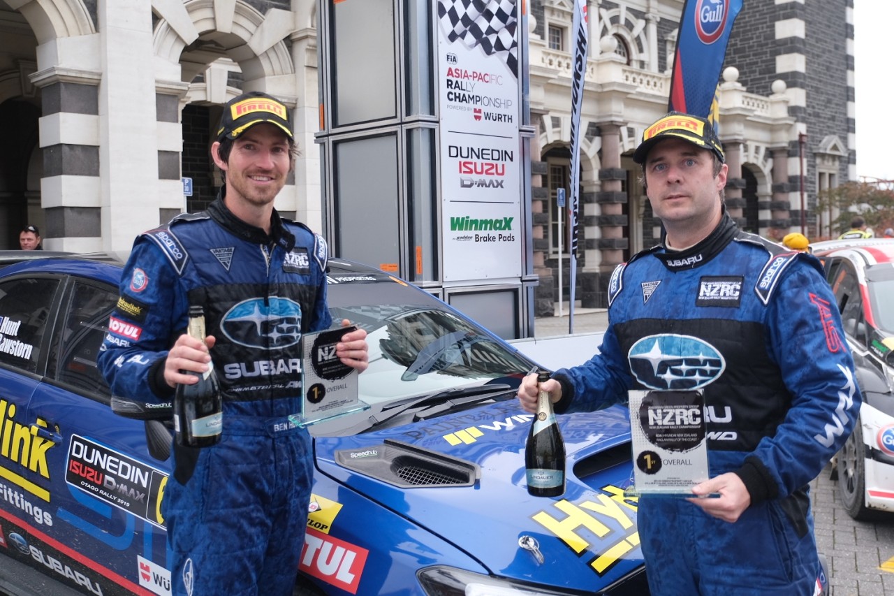 Subaru driver Ben Hunt (left) and co-driver Tony Rawstorn celebrate winning the NZRC section of the Drivesouth Rally of Otago . Photo: Geoff Ridder.