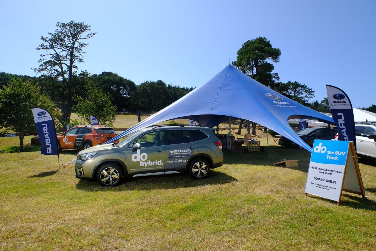 Two especially-branded XV and Forester Subarus let the crowds know via their signage that the e-Boxer hybrid versions of their models were coming soon.