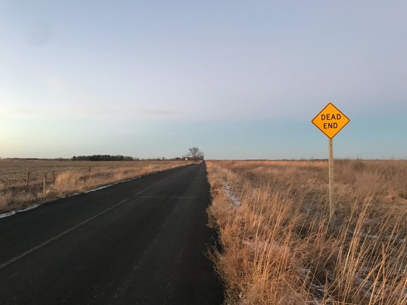Dead end sign on country road