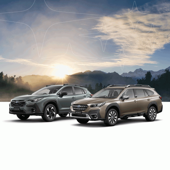Subaru Outback and Subaru Crosstrek on a landscape background