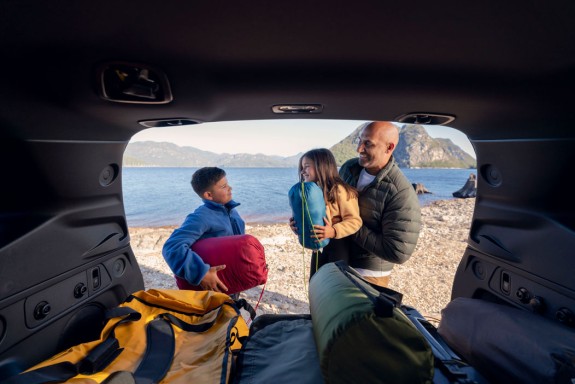 Dad and Kids out the back of the Forester