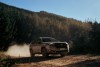 The all-new Forester features a bolder, more athletic exterior, highlighting a dynamic front fascia with a redesigned grille, muscular wheel arches, and striking C-shaped LED headlights.